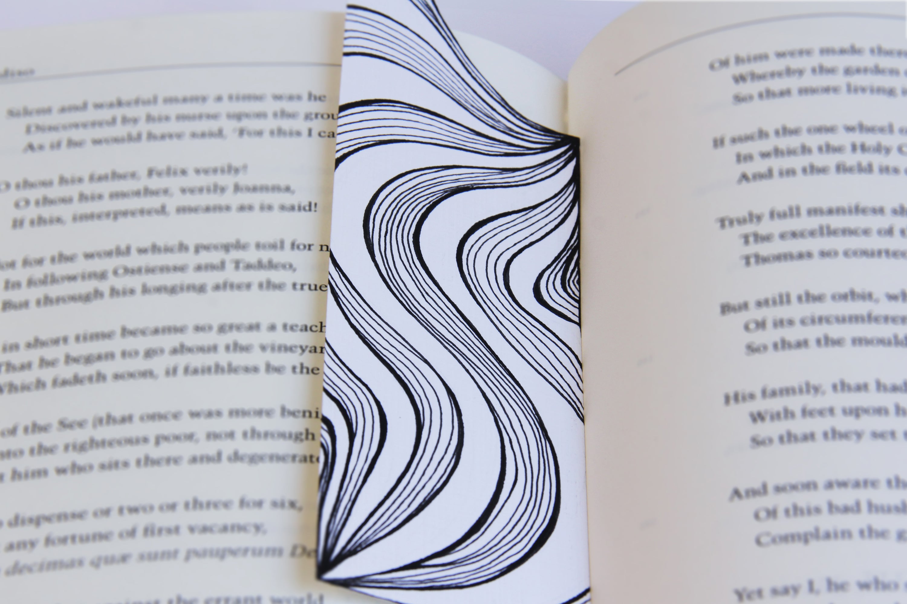 Bookmark wavy line Art patterns organic handmade hand-painted Black and White in a book