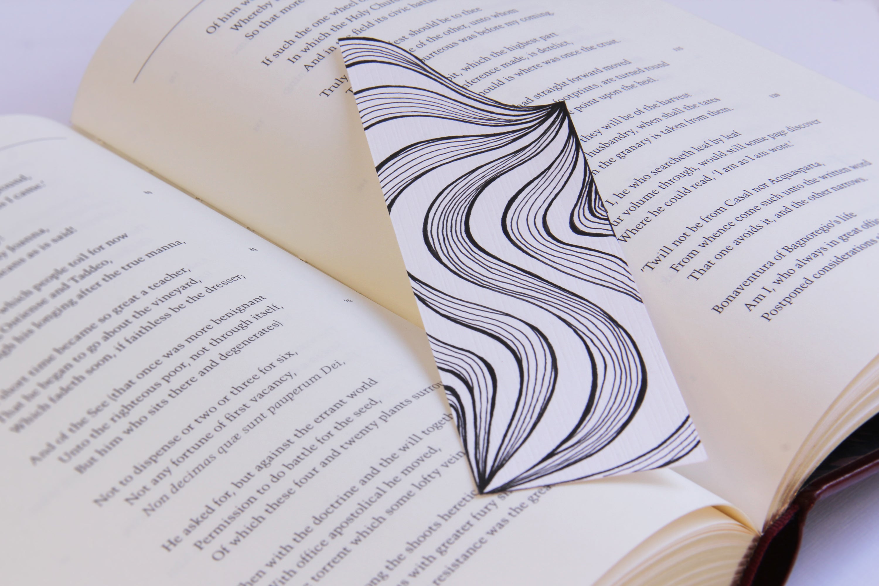 Bookmark wavy line Art patterns organic handmade hand-painted Black and White in a book